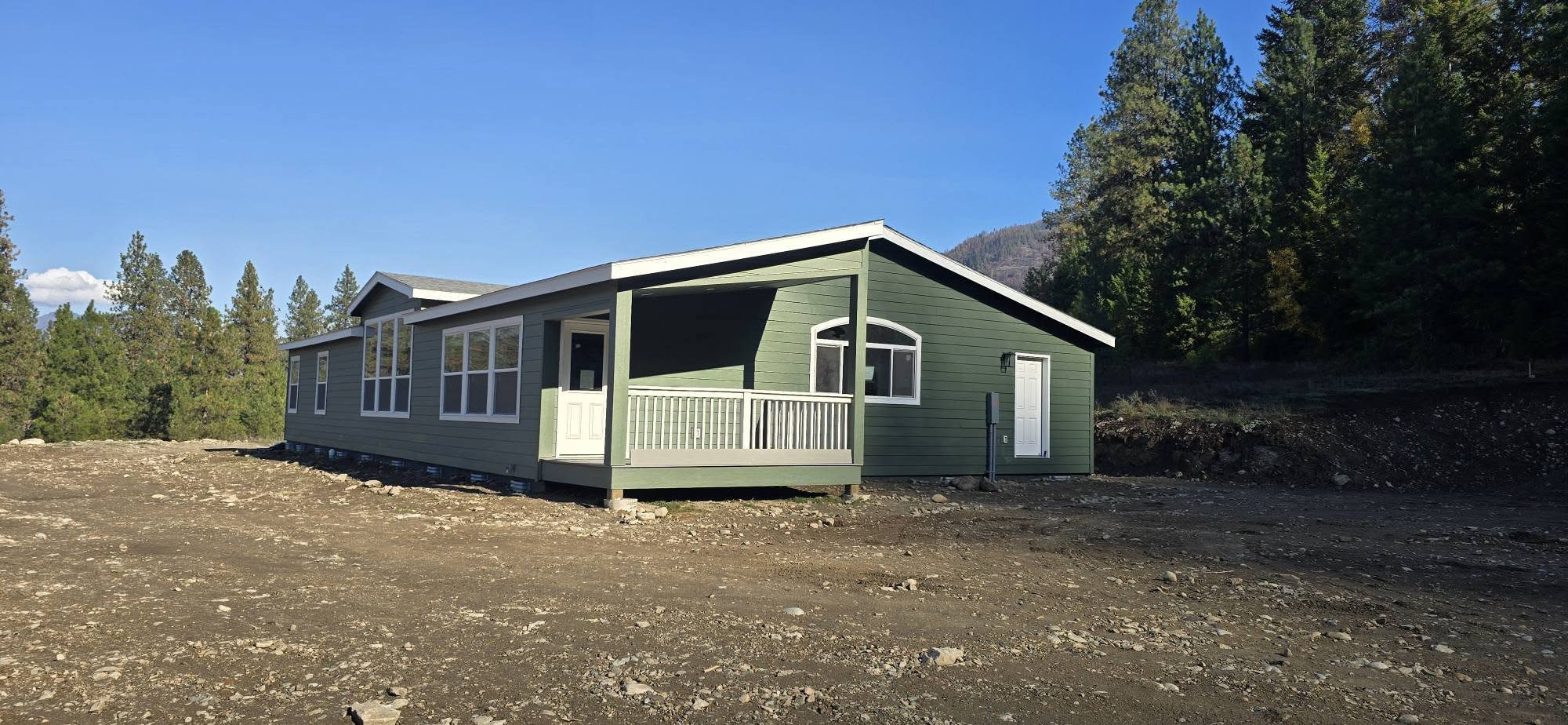 Completed green manufactured home on prepared site
