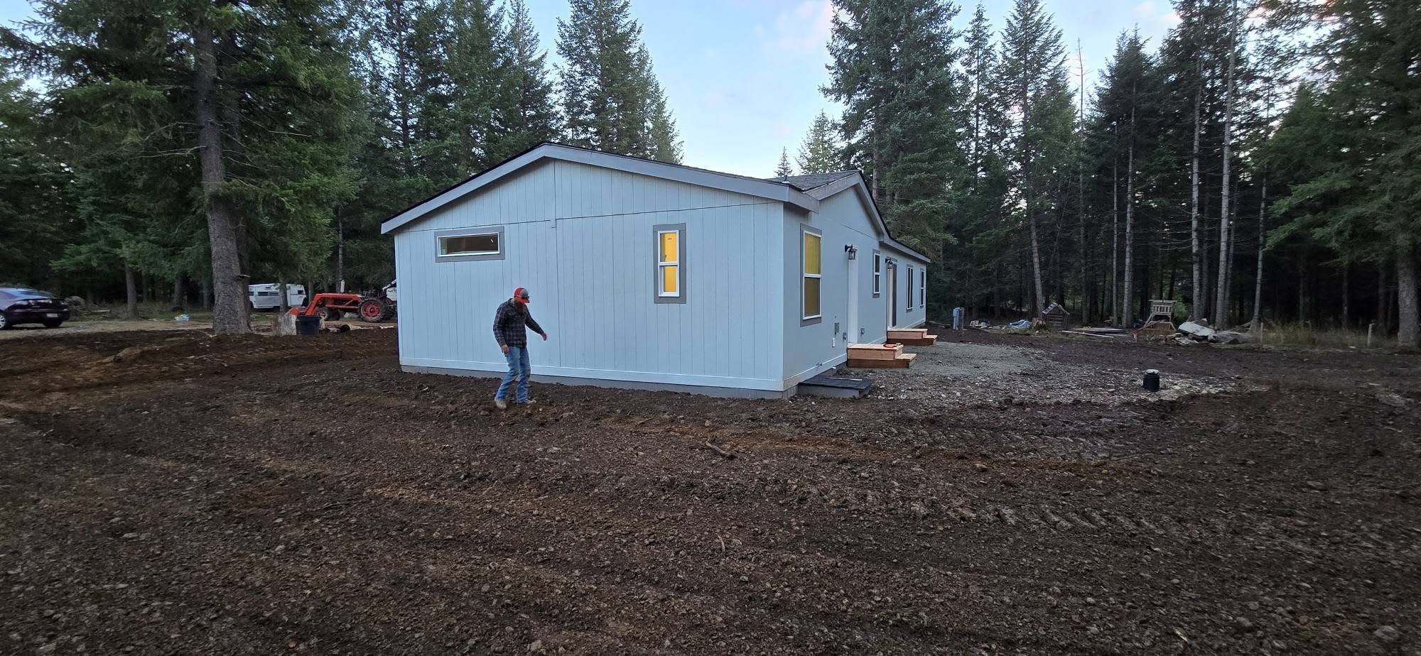 Completed home placed in wooded setting