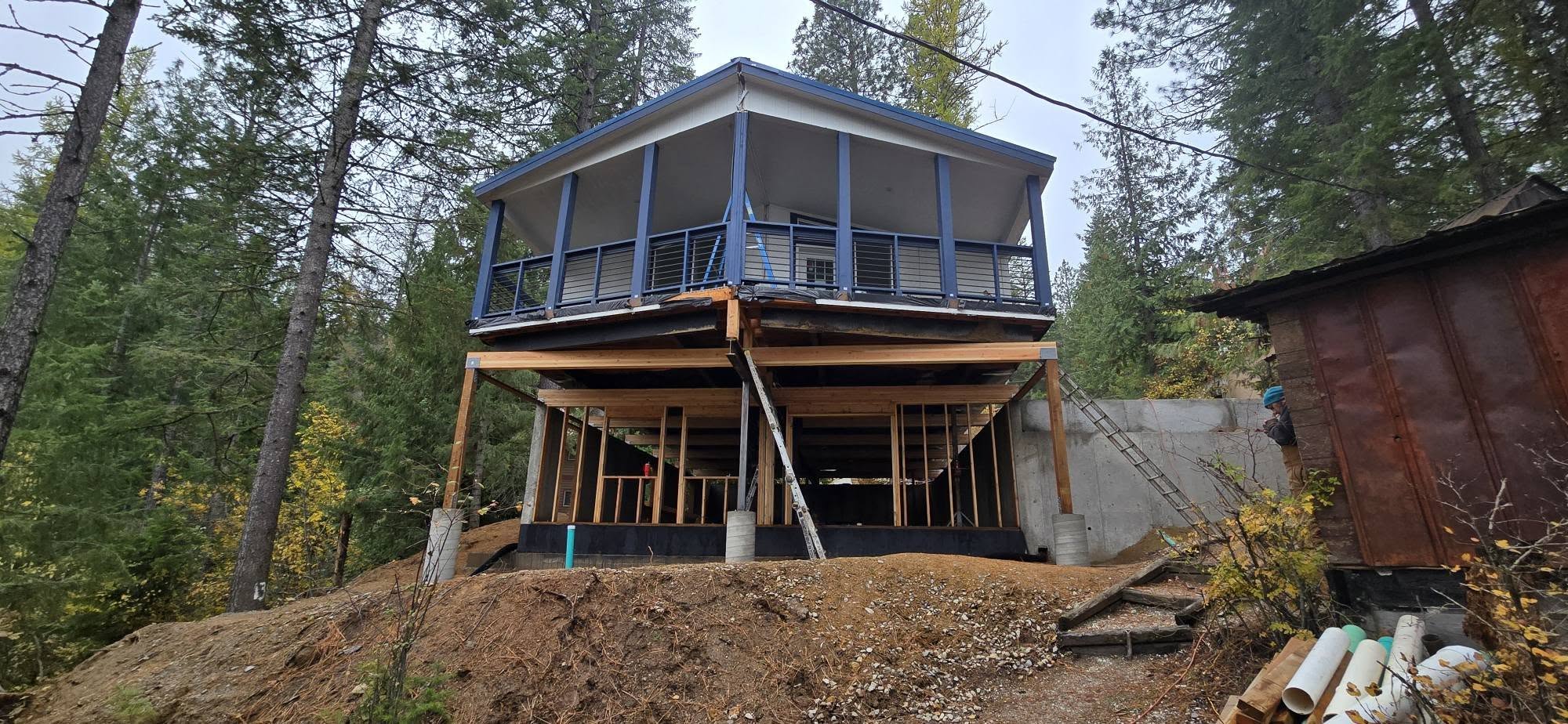 Elevated home project showing structural support work