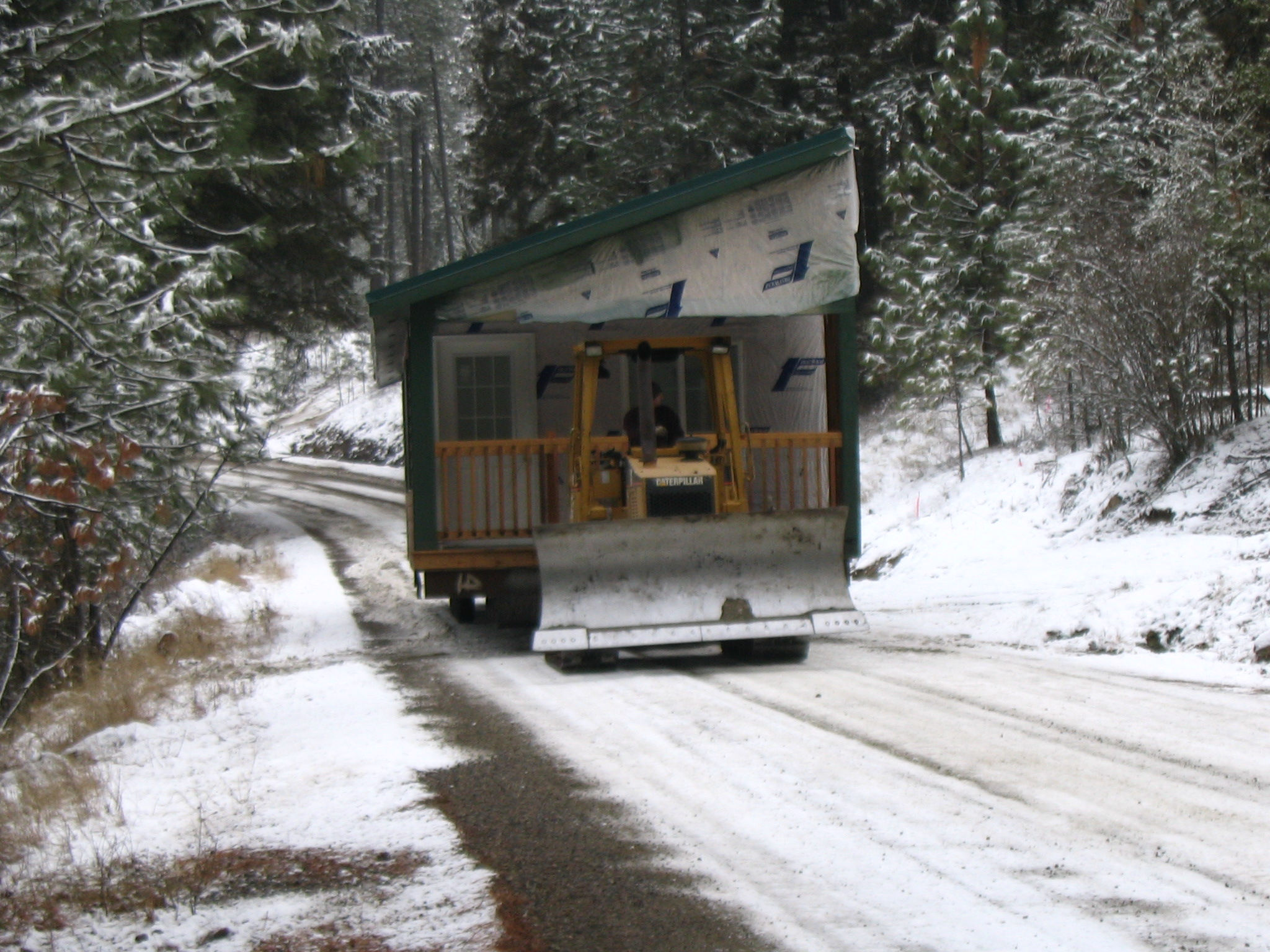 Bulldozer operating on a snowy Yukon site